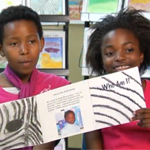 Students reading their Research-Based Animal Trifold sotries