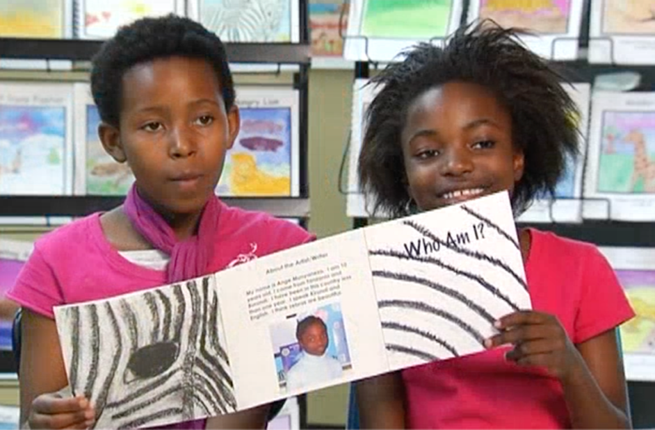 Students reading their Research-Based Animal Trifold sotries