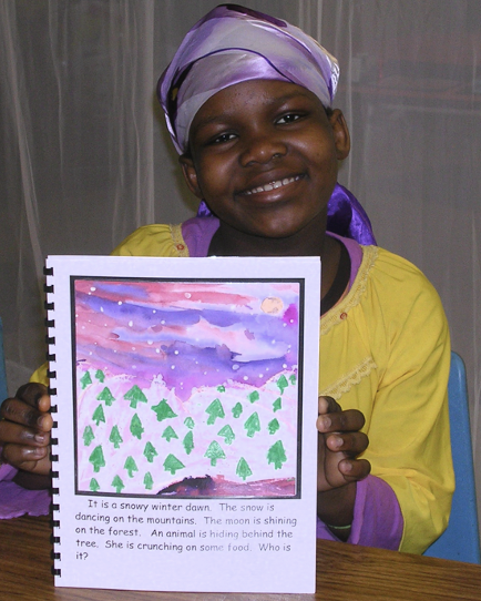 Winter Stories student showing off her completed book